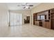 Open living area with backyard access, built-in shelving, and neutral color palette at 4718 E Woburn Ln, Cave Creek, AZ 85331