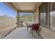 A covered patio featuring outdoor seating and a grill, creating a great space for entertaining and enjoying the weather at 4718 E Woburn Ln, Cave Creek, AZ 85331