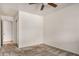 Bedroom features carpet, a ceiling fan, and a closet at 5101 E Toniko Dr, Phoenix, AZ 85044