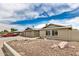Residential house featuring low-maintenance landscaping and a two-car garage at 5101 E Toniko Dr, Phoenix, AZ 85044