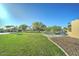 Spacious backyard includes a pool and a basketball court for outdoor recreation at 6519 E Cactus Rd, Scottsdale, AZ 85254