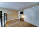 Bedroom featuring a bunk bed, carpet flooring, and sliding door closet at 6519 E Cactus Rd, Scottsdale, AZ 85254