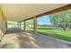 Spacious covered patio overlooks the beautiful backyard with a basketball court at 6519 E Cactus Rd, Scottsdale, AZ 85254
