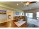 Spacious living room features hardwood floors, ample natural light, and comfortable seating at 6519 E Cactus Rd, Scottsdale, AZ 85254