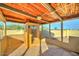 Spacious covered patio featuring a sauna, tile flooring, and a tranquil view at 6519 E Cactus Rd, Scottsdale, AZ 85254