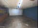 Spacious two-car garage with a white door at 664 N Glenview --, Mesa, AZ 85213