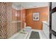 This modern bathroom features colorful wall tiling, a standing shower, and a toilet at 7167 E Rancho Vista Dr # 5001, Scottsdale, AZ 85251