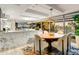 Dining area featuring a wooden table, comfortable seating, and picturesque outdoor views at 7167 E Rancho Vista Dr # 5001, Scottsdale, AZ 85251