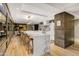 Modern kitchen with a large marble island, wooden barstools and stainless steel appliances at 7167 E Rancho Vista Dr # 5001, Scottsdale, AZ 85251