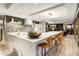 Gourmet kitchen with marble countertops, modern appliances, and a spacious island with seating at 7167 E Rancho Vista Dr # 5001, Scottsdale, AZ 85251