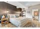 This interior design features an accent wall, hanging lamps, and an eye-catching bed set at 7167 E Rancho Vista Dr # 5001, Scottsdale, AZ 85251