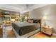 This modern bedroom is naturally lit and offers scenic outdoor views with comfortable seating at 7167 E Rancho Vista Dr # 5001, Scottsdale, AZ 85251