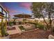 A rooftop patio is furnished with lounge seating, a grill, and perimeter greenery at 7167 E Rancho Vista Dr # 5001, Scottsdale, AZ 85251