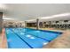 Bright indoor swimming pool and gym with large windows at 7167 E Rancho Vista Dr # 5001, Scottsdale, AZ 85251