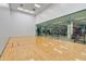 Spacious racquetball court featuring glass wall with view to gym equipment, perfect for an active lifestyle at 7167 E Rancho Vista Dr # 5001, Scottsdale, AZ 85251