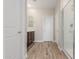Bathroom with tile floors, wood cabinets, and a shower with glass doors at 7229 E Cattle Call St, San Tan Valley, AZ 85143