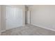Bedroom featuring a closet and neutral carpeted floors at 7229 E Cattle Call St, San Tan Valley, AZ 85143