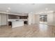 Open concept living area featuring a kitchen with stainless steel appliances and tile floors at 7229 E Cattle Call St, San Tan Valley, AZ 85143