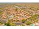 An aerial view of the community showcasing lush landscaping,tile roofs and a resort style pool at 7297 E Black Rock Rd, Scottsdale, AZ 85255