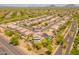 Aerial view of a residential community with manicured lawns, mature landscaping, and many homes with private pools at 7297 E Black Rock Rd, Scottsdale, AZ 85255