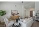 Bright living room with comfortable seating, stylish decor, and a view of the home's entry at 7297 E Black Rock Rd, Scottsdale, AZ 85255