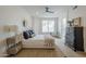 Inviting bedroom featuring neutral tones, ceiling fan and a cozy rug, complemented by natural light at 7297 E Black Rock Rd, Scottsdale, AZ 85255