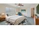 Inviting main bedroom with plantation shutters, soft carpet and serene decor at 7546 W Mary Jane Ln, Peoria, AZ 85382