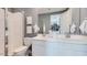 Elegant bathroom with a double vanity, modern fixtures, and a glass-enclosed shower at 8149 E Petunia Ave # 1007, Mesa, AZ 85212