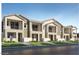 New townhomes with landscaped front yards and white picket fences at 8149 E Petunia Ave # 1007, Mesa, AZ 85212