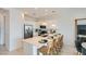Modern kitchen featuring white cabinets, stainless steel appliances, and a center island at 8149 E Petunia Ave # 1007, Mesa, AZ 85212