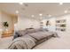 Finished basement boasting recessed lighting, ample seating, and modern entertainment features at 8230 E Wood Dr, Scottsdale, AZ 85260