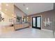 Bright bathroom featuring double vanities, modern lighting, and mirrors at 8230 E Wood Dr, Scottsdale, AZ 85260