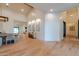 Open dining area with wood floors and sophisticated decor, perfect for entertaining guests at 8230 E Wood Dr, Scottsdale, AZ 85260