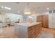 Spacious kitchen featuring a large island with storage, modern appliances, and a functional layout at 8230 E Wood Dr, Scottsdale, AZ 85260