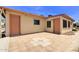 An expansive backyard patio featuring dual doors and a tile surface at 863 Leisure World --, Mesa, AZ 85206