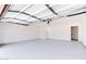 An attached garage with epoxy flooring providing space for vehicles and storage at 863 Leisure World --, Mesa, AZ 85206