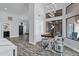 Bright breakfast nook features an elegant table with seating and clerestory windows at 8913 S Forest Ave, Tempe, AZ 85284