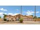 Charming single-story home featuring a terracotta roof, desert landscaping, and a spacious two-car garage at 8913 S Forest Ave, Tempe, AZ 85284