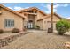 Charming single-story home featuring a neutral color palette, tile roof, and rock landscaping at 8913 S Forest Ave, Tempe, AZ 85284