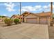 Charming single-story home featuring a neutral color palette, tile roof, and a spacious two-car garage at 8913 S Forest Ave, Tempe, AZ 85284