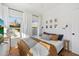 Bright bedroom with ample natural light, a comfortable bed and tasteful decor at 905 E Coronado Rd, Phoenix, AZ 85006