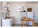 Bright kitchen features modern appliances, a dining table, and decorative accents at 905 E Coronado Rd, Phoenix, AZ 85006