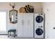 Well-organized laundry room with modern appliances, storage cabinet, and accent decor at 905 E Coronado Rd, Phoenix, AZ 85006