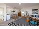 Versatile living space features a sleeping area, full dining set and a kitchenette at 905 E Coronado Rd, Phoenix, AZ 85006