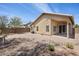 Spacious backyard with low-maintenance gravel landscaping, and covered patio at 93 S Sandstone St, Gilbert, AZ 85296