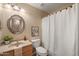Cozy bathroom featuring a neutral color scheme and shower-tub combo at 93 S Sandstone St, Gilbert, AZ 85296