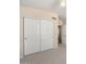 Bedroom with carpet and double-door closet, offering ample storage at 93 S Sandstone St, Gilbert, AZ 85296