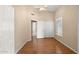 Bedroom featuring wood floors, ceiling fan, and natural light at 93 S Sandstone St, Gilbert, AZ 85296