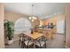 Bright and airy dining area offers a seamless flow to the kitchen, perfect for casual meals at 93 S Sandstone St, Gilbert, AZ 85296