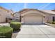 Charming home featuring a two-car garage, well-maintained landscaping, and a tiled roof at 93 S Sandstone St, Gilbert, AZ 85296